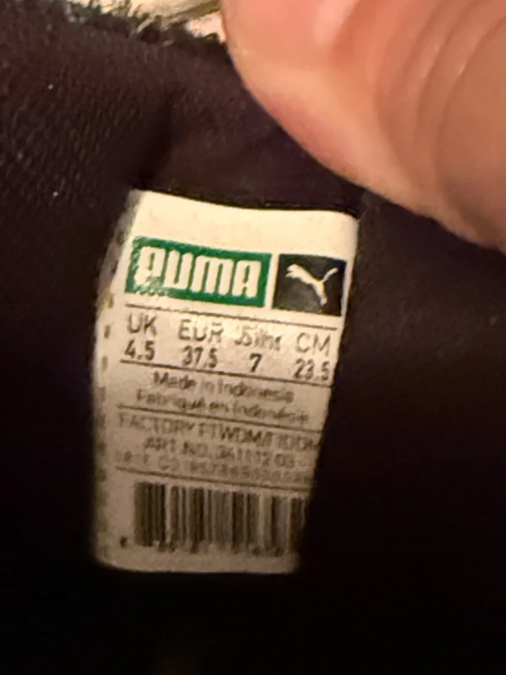 Puma Black Fuzzy Low-Top Sneakers with White Sole